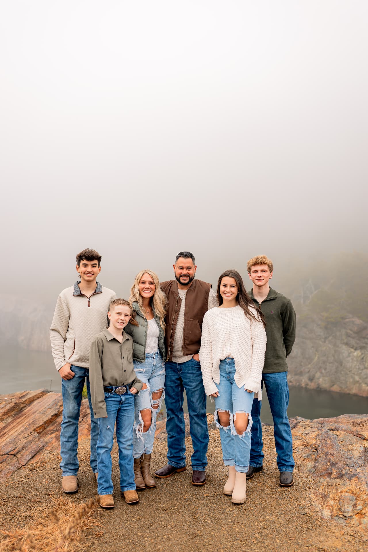 Bryan and his family together on a rocky overlook